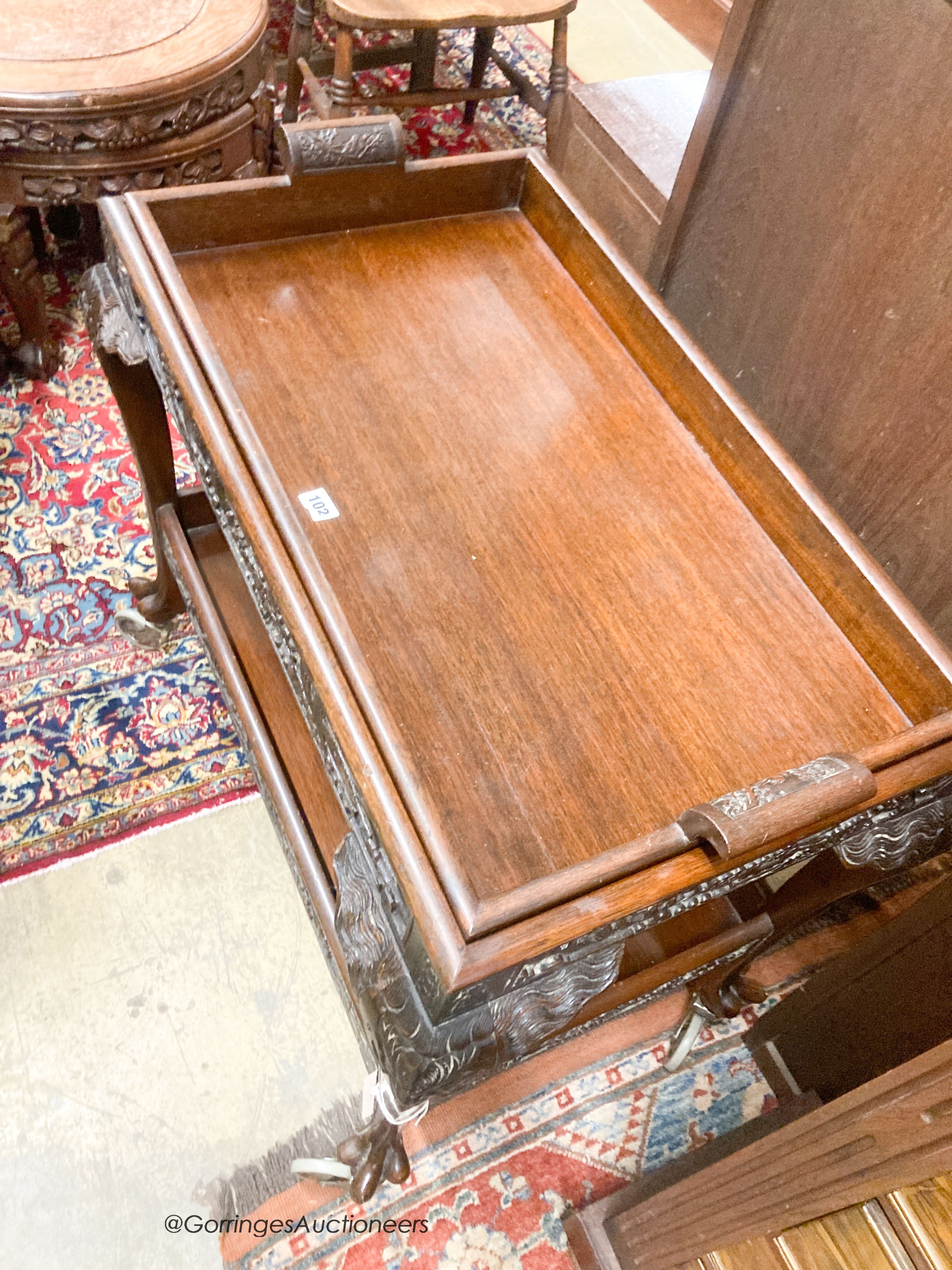 A Chinese carved hardwood tea trolley, with removable tray, width 80cm, depth 50cm, height 75cm